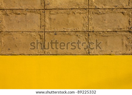 Walls of brown clay. Walls of brown clay. Located on the cement walls are yellow.