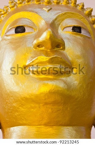 Face golden Buddha. Face golden Buddha as contemporary art.