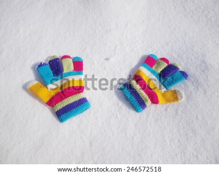 children winter gloves in snow