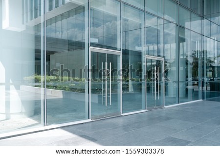 Empty ground in front of modern glass wall facade buildings . Stock foto © 