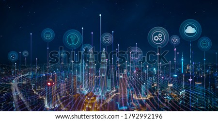Photo of Panorama aerial view in the cityscape skyline with smart services and icons, internet of things, networks and augmented reality concept , night scene .