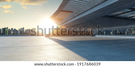 Perspective view of empty concrete floor with cement structure and wooden wall building exterior. 3d rendering. Mixed media.