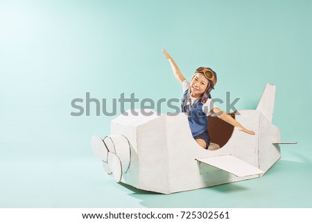 Similar – Image, Stock Photo Girl playing with cardboard binoculars while camping at home