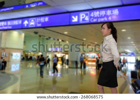 women at the airport with luggage