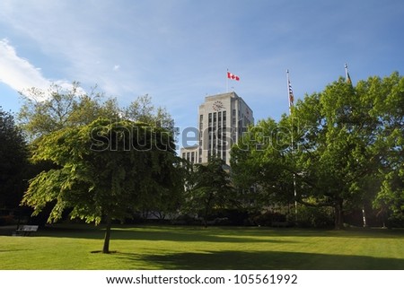 Vancouver City Hall, British Columbia. The Vancouver City Hall building and surrounding lawn and trees. Vancouver, British Columbia, Canada.