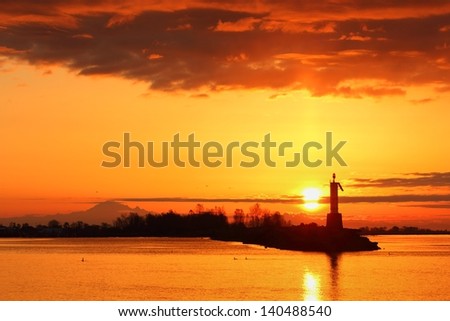Sun Up, Steveston Harbor, British Columbia. Sunrise over the harbor of Steveston, British Columbia, Canada near Vancouver. Steveston is a small fishing village on the banks of the Fraser River.