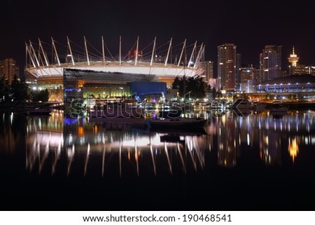 False Creek Night, Vancouver. Vancouver False Creek view of the city skyline and the sports stadiums at night. British Columbia, Canada.