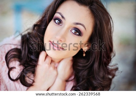 Portrait of a beautiful girl with a blurred background.