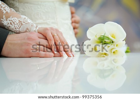 Hands of married couple