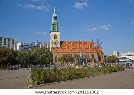 BERLIN,OKTOBER 02:2014 Tourist visit St. Mary Church, known in German as the Marienkirche, located in central Berlin, near Alexanderplatz in Oktober,2014
