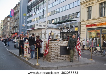 BERLIN, GERMANY - OCTOBER 03, 2014: Checkpoint Charlie. The crossing point between East and west Berlin became a symbol of the Cold War.