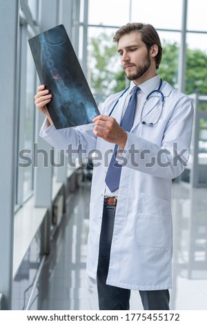 Image, Stock Photo caucasian doctor holding test tube with blood for 2019-nCoV analyzing. Chinese Corona virus blood test concept