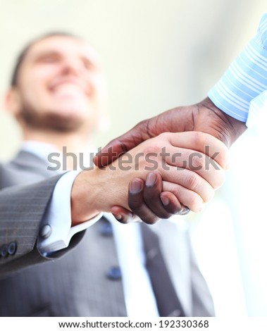Business handshake. Business man giving a handshake to close the deal