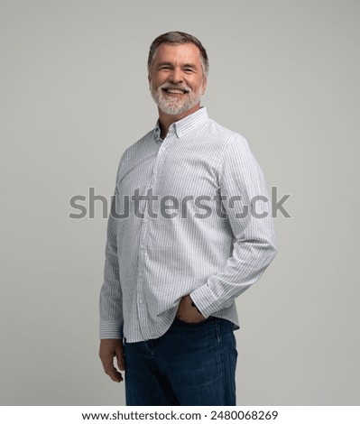 Image, Stock Photo An older man with a beard looks to the side tensely.