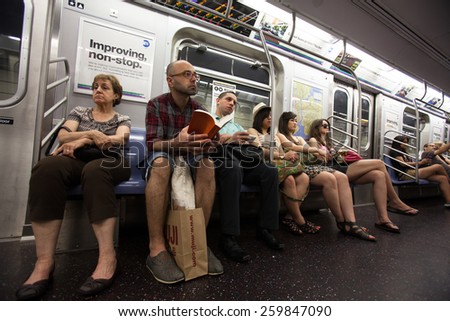 NEW YORK, MAY 30: Commuters travel on the New York underground metro, in New York, United States on May 30, 2011