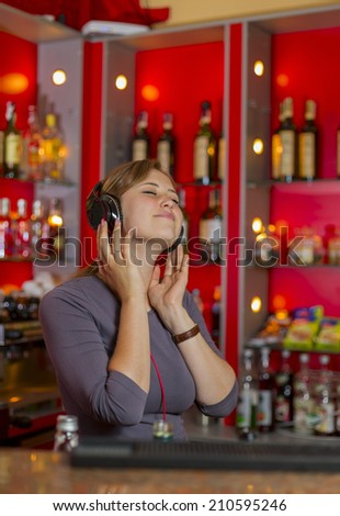 girl listening to music at work