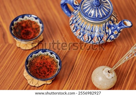 Similar – Image, Stock Photo Artisan polishing wooden detail using sandpaper in carpentry workshop