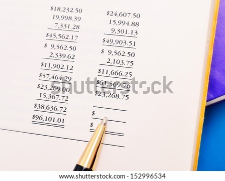 woman\'s hand with the financial statements