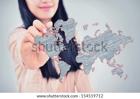 woman drawing the world map, isolated on grey background