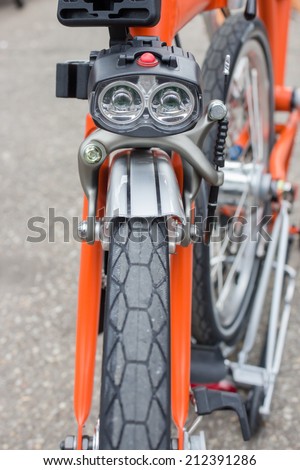 Detail of orange Bike Front-light