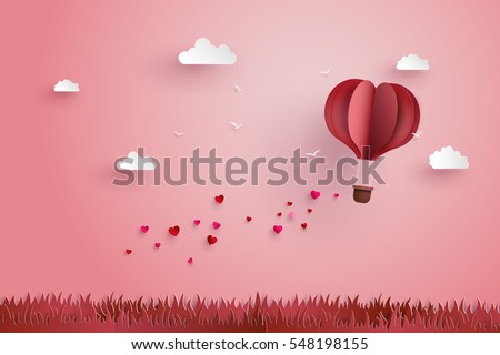 illustration of love and valentine day,Origami made hot air balloon flying over grass with heart float on the sky.paper art and  digital craft style. Foto stock © 