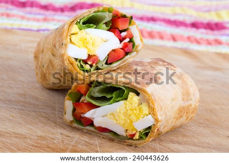 egg cheese and pepper sandwich wrap in tortilla