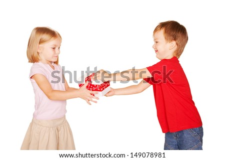 Little boy giving a little girl a gift. Present for a birthday, valentine\'s day or other holiday, ready for your text or symbols. Holiday Sale. Isolated on white background