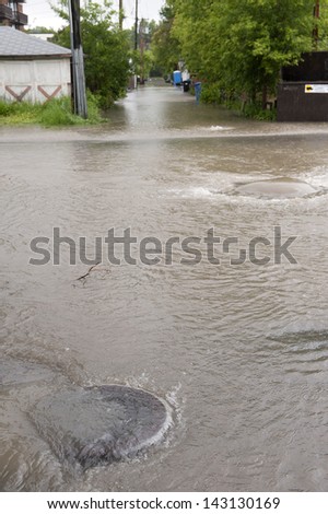 Calgary Flood 2013; Back Flowing Storm Sewers