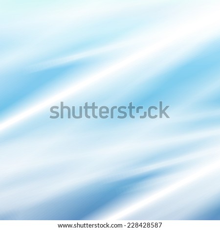 abstraction of blurred white shapes on blue background