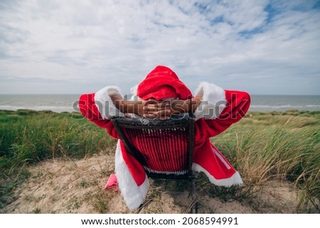 Similar – Image, Stock Photo Man chilling on deckchair in sunshine