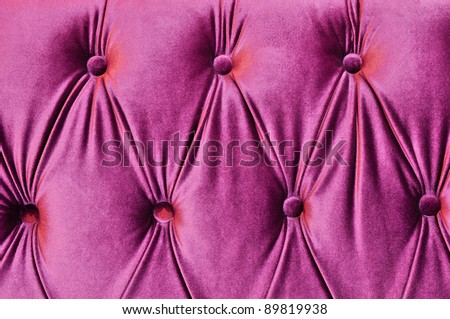 Detail of glamour violet sofa texture close-up