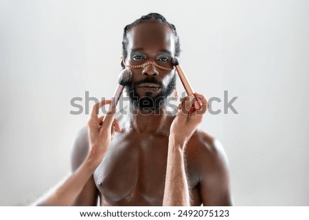 Similar – Image, Stock Photo Serious shirtless African American man with fists in studio