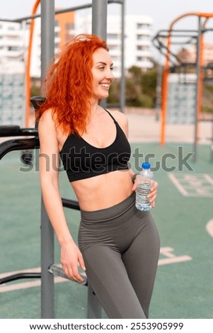 Similar – Image, Stock Photo Thoughtful young female athlete listening to music in studio