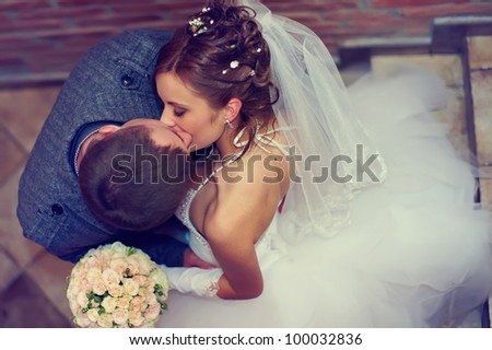 beautiful  bride and groom kissing. top view