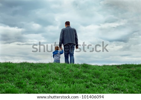Similar – Image, Stock Photo Lonely kid walking on a road. Aerial view