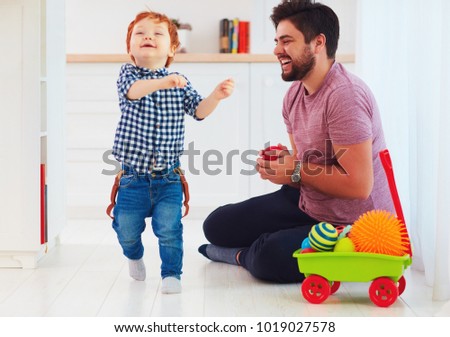 Similar – Image, Stock Photo Young parents playing with their child at home