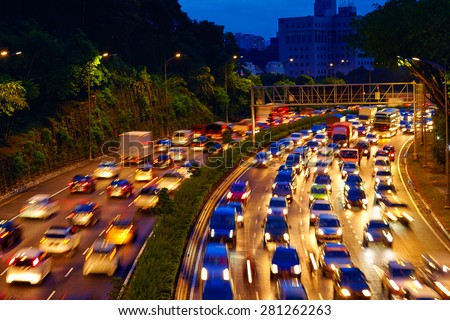 heavy traffic moving on the road in twilight, Kuala Lumpur