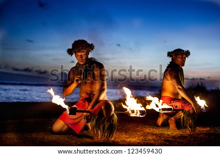 Two Hawaiian Men preparing to Dance with Fire in Maui