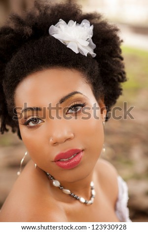 African American Bride close up looking at camera with beautiful eyes