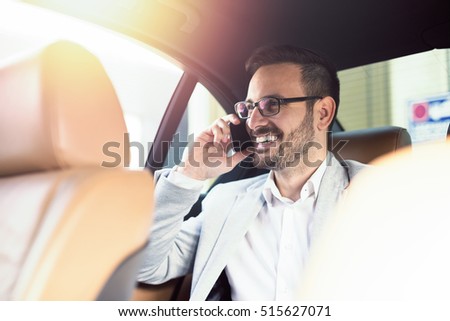 Similar – Image, Stock Photo Concentrated male passenger using laptop in train