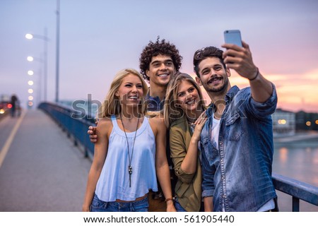 Similar – Image, Stock Photo Casual tourist making photo on smartphone of nature