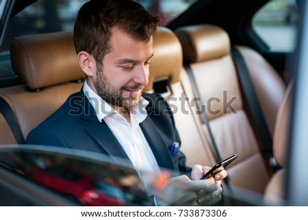 Similar – Image, Stock Photo Concentrated male passenger using laptop in train