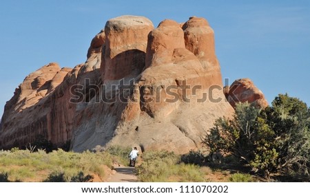 Hikers at Devil's Garden Rocky Formations at Arches National Park in Utah, USA Stock fotó © 