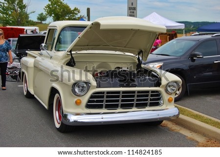 FREDERICK, MD- SEPTEMBER 16:White Vintage Ford Pickup Truck on Sept. 16, 2012 in Frederick , MD USA. Alzheimer\'s Association Benefit Car Show at Motor Vehicle Administration in Maryland.