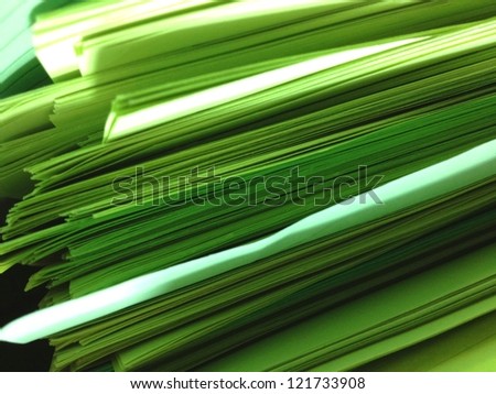Green Pile of Papers Background