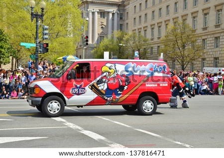 WASHINGTON, DC - APRIL 13: Cherry Blossom Parade on April 13, 2013 in Washington DC,USA.The parade is a spring celebration in Washington D.C.and people from all over the world come to watch the event
