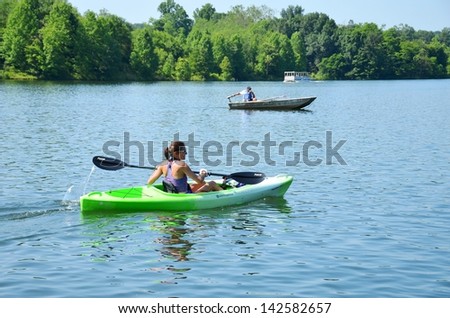 GERMANTOWN,MD- JUNE 8: Kayakers at Balck Hill Park in Maryland USA on June 6, 2013.Black Hill Park offers a variety of outdoor activities, and many people come to ride boats, and kayaks in the summer.