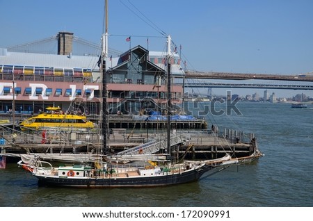 NEW YORK , USA - SEPTEMBER 20: Pier 17 at Lower Manhattan in New York on September 20, 2013. South Street Seaport is a historic area in the New York City of Manhattan on the East River area.