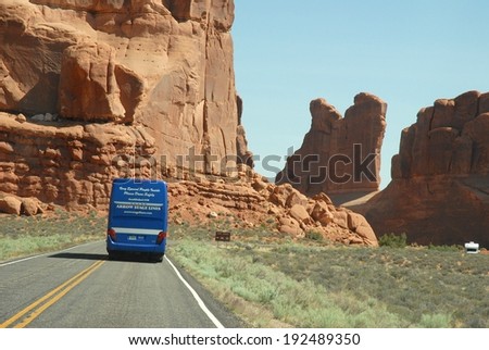 ARCHES NATIONAL PARK UTAH,USA - MAY 07: Bus Tour at Arches National Park on May 07, 2009 in Utah, USA. Arches National Park is one of the most beautiful, and famous national parks in Utah.