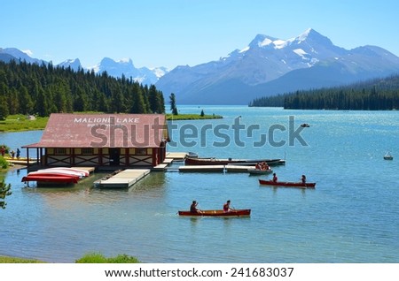 JASPER, ALBERTA - AUGUST 1 - Boat Tours at Maligne Lake in Jasper, Canada on August 01, 2014. Maligne Lake is visited by millions of people every year, and do the boat tour to Spirit Island